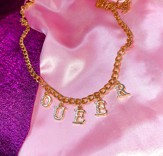 Diamanté QUEER gold colour letter charm necklace