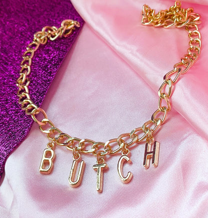 Chunky BUTCH gold colour letter charm necklace