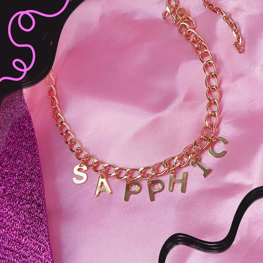 SAPPHIC gold colour letter charm necklace