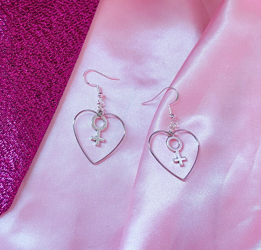 Silver colour heart and Venus charm earrings
