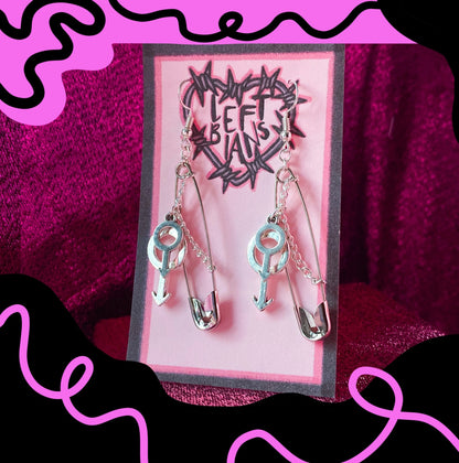 Safety pin earrings with Double mars charms