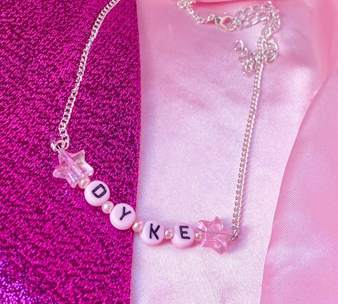 Pink dyke letter bead necklace