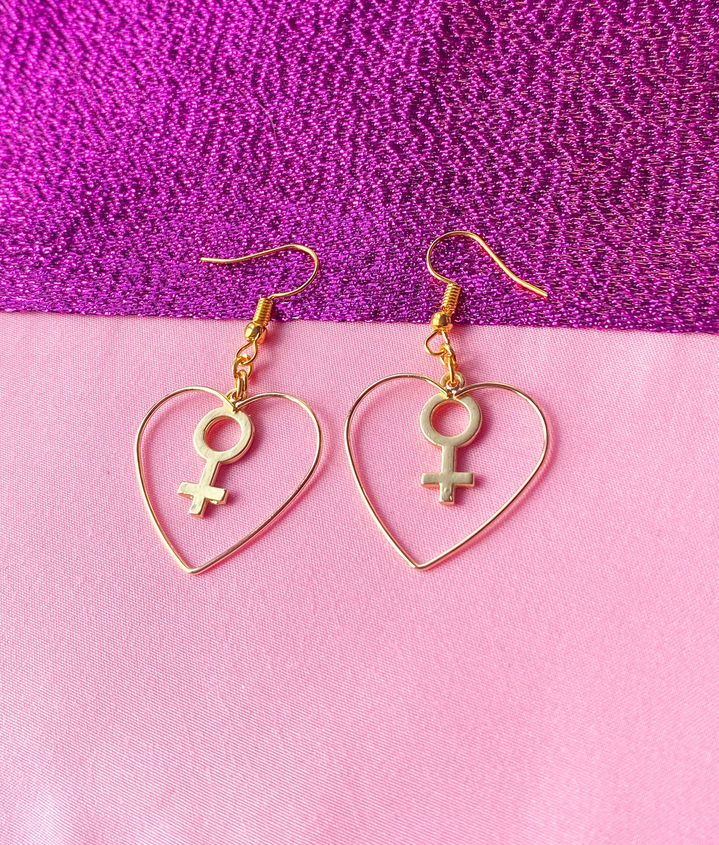 Gold colour heart and venus charm earrings