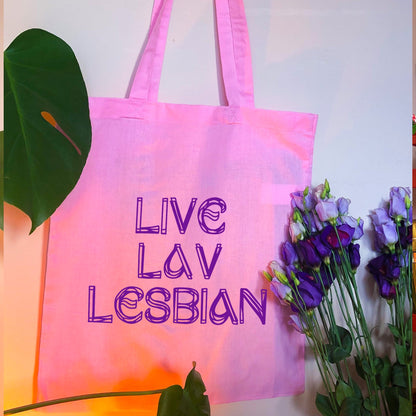 Live Lav Lesbian, pink tote bag with purple vinyl text. Leftbians Collab with Lavender Rodriguez