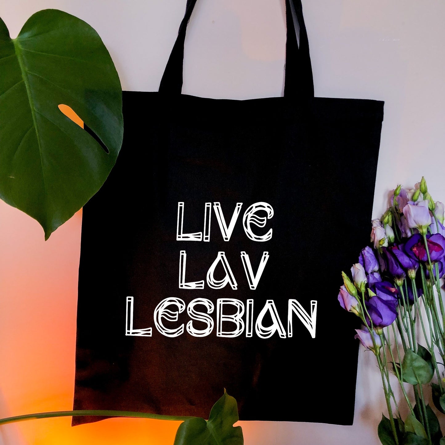 Live Lav Lesbian, black tote bag with white vinyl text. Leftbians Collab with Lavender Rodriguez