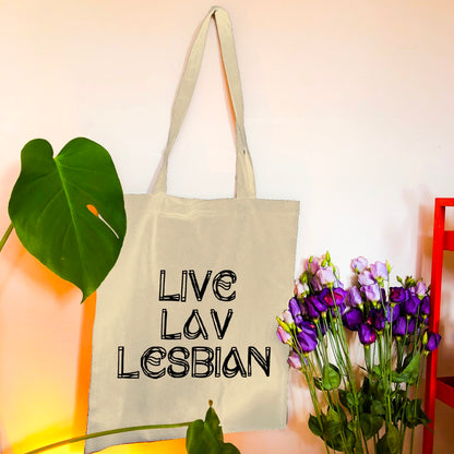 Live Lav Lesbian, Beige tote bag with black vinyl text. Leftbians Collab with Lavender Rodriguez