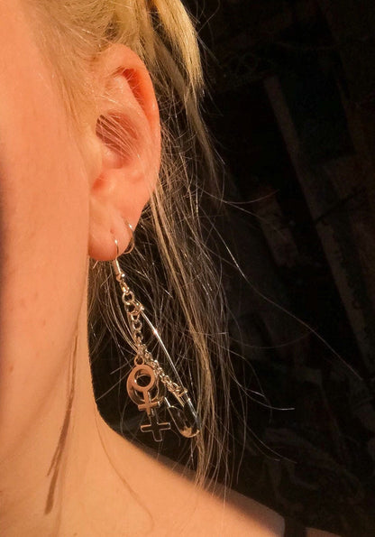 Safety pin earrings with Double Venus symbol