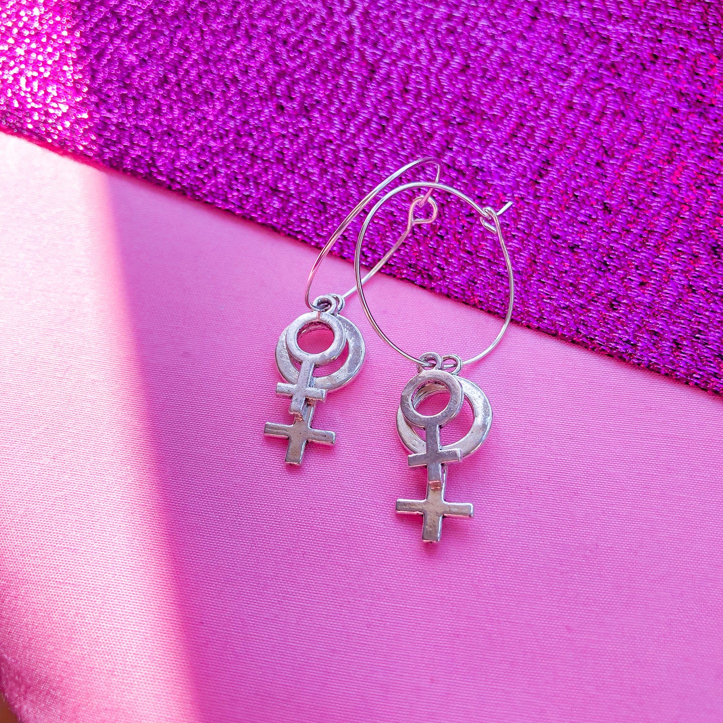 Double Venus silver symbol hoop earrings