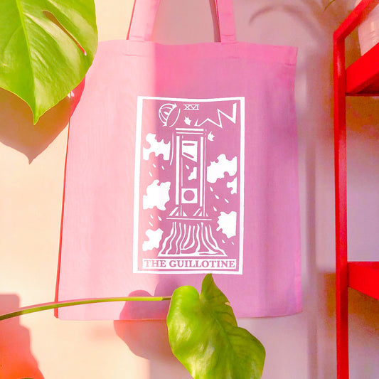 The Guillotine tarot card light pink tote bag