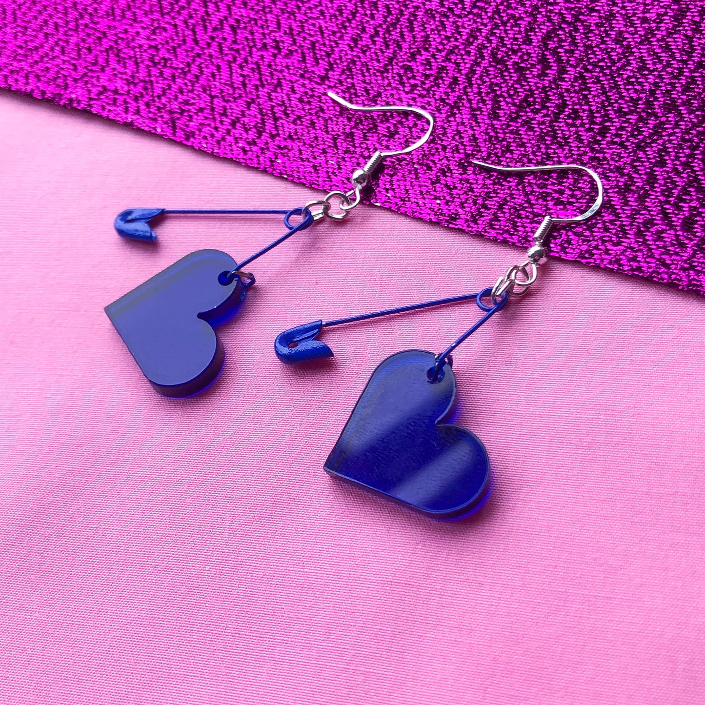 Blue safety pin and acrylic heart earrings