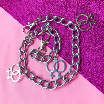 Jean chain with multiple Double Venus symbol charms